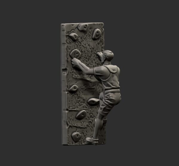 Escultura de escalador montada en la pared